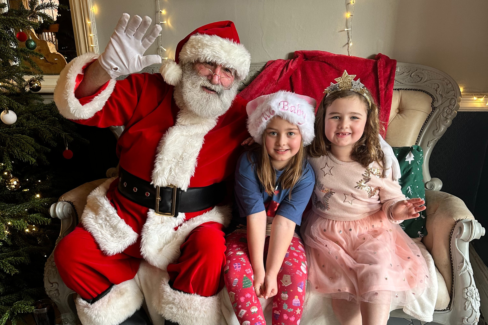 Children sitting with Santa